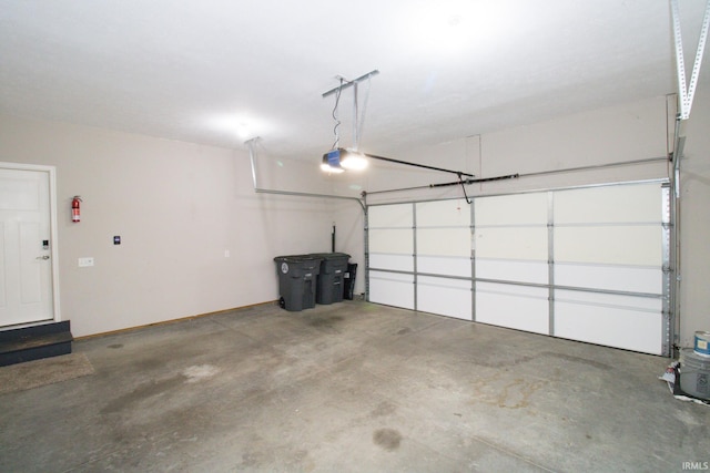 garage featuring a garage door opener