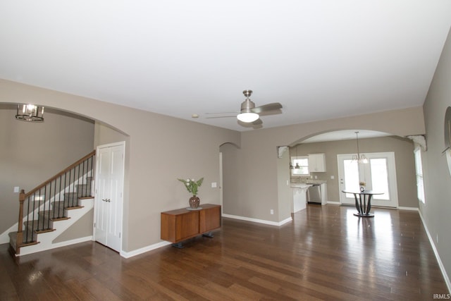 interior space featuring ceiling fan and dark hardwood / wood-style flooring