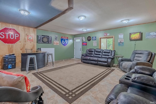 living room featuring a textured ceiling