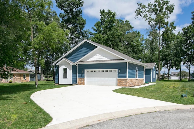 ranch-style house featuring a garage and a front yard