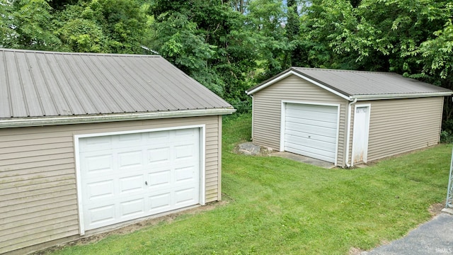 garage featuring a yard