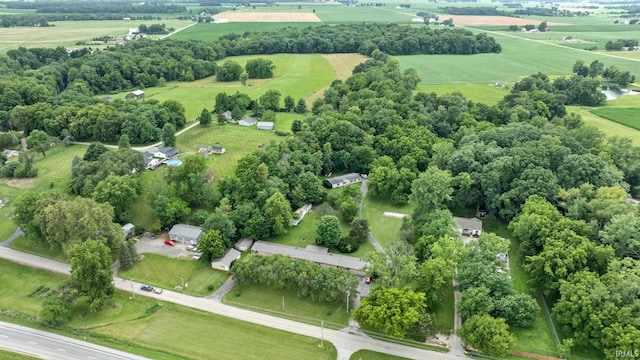 birds eye view of property featuring a rural view