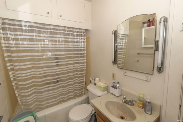 full bathroom with shower / bath combo, vanity, and toilet