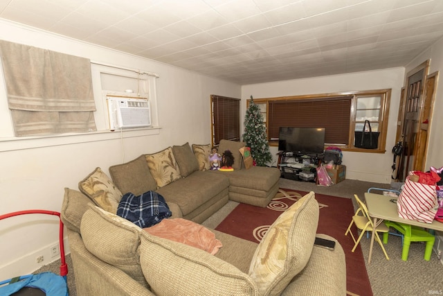 living room with cooling unit and dark carpet