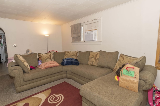 living room with crown molding and cooling unit