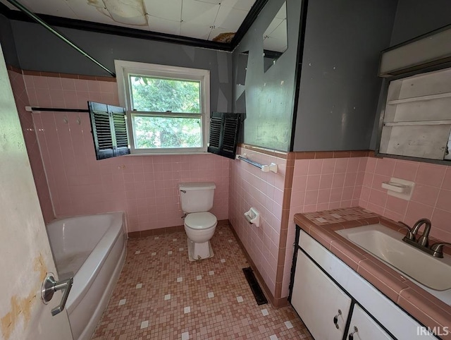 bathroom featuring tile patterned flooring, tile walls, decorative backsplash, toilet, and vanity