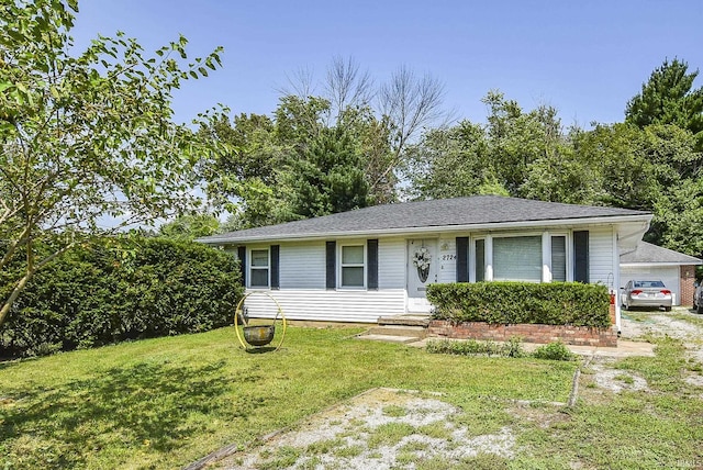 ranch-style home with a front yard