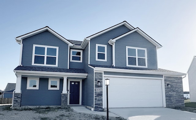 view of front of home with a garage