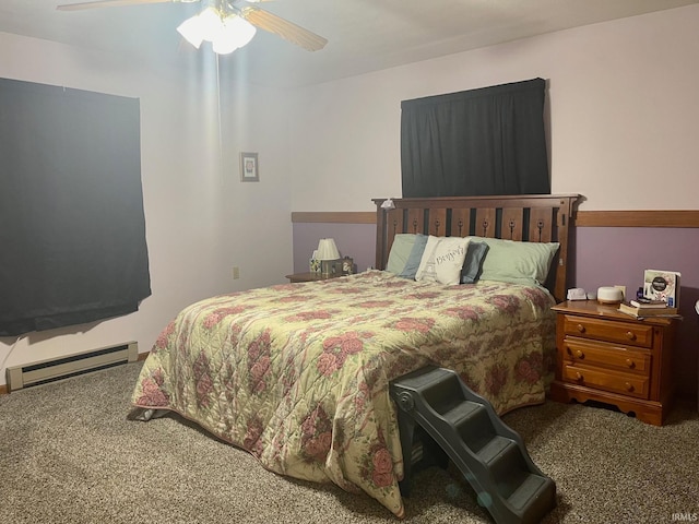 carpeted bedroom featuring a baseboard radiator and ceiling fan