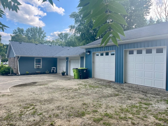 single story home featuring a garage