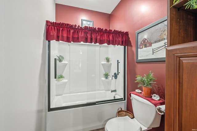 bathroom with toilet and enclosed tub / shower combo