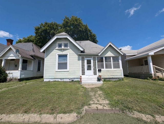 view of front of home with a front yard