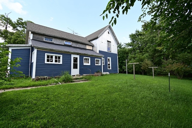 exterior space featuring a front lawn