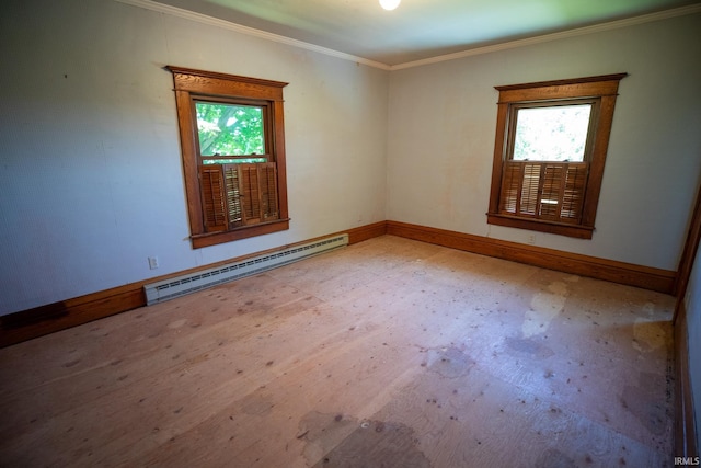 empty room with ornamental molding and a baseboard heating unit