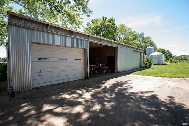 garage with a lawn