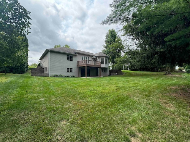 view of yard with a wooden deck