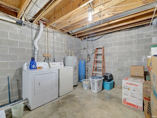 basement featuring independent washer and dryer and gas water heater