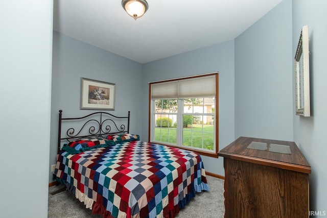 bedroom with light carpet