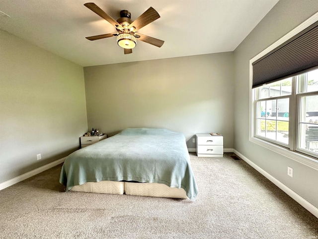 bedroom with carpet floors and ceiling fan