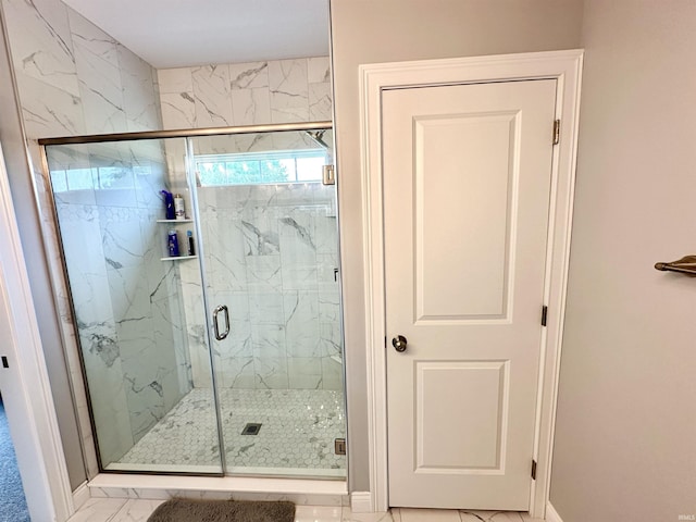 bathroom featuring walk in shower