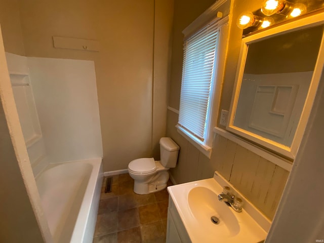 full bathroom with vanity, toilet, bathing tub / shower combination, and tile patterned flooring