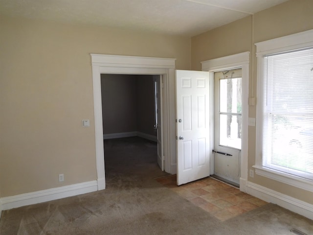 empty room with carpet floors