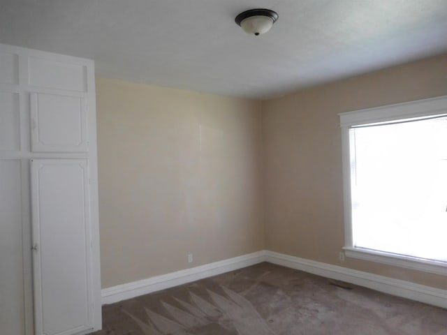 empty room with carpet floors