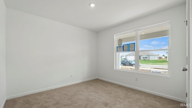 view of carpeted spare room