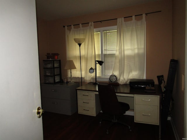 office space with dark hardwood / wood-style floors