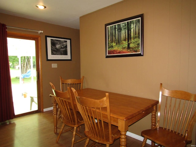 dining room with wood-type flooring