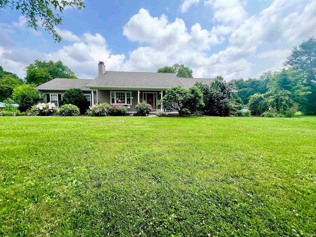 ranch-style house with a front yard