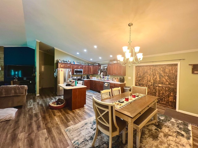 dining room with crown molding, a chandelier, hardwood / wood-style flooring, and lofted ceiling