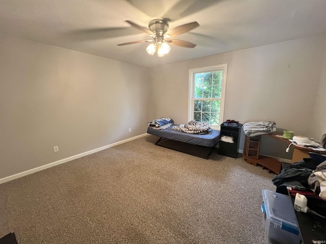 unfurnished bedroom with baseboards, carpet floors, and ceiling fan