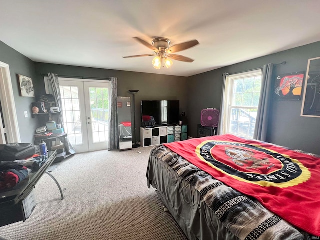 bedroom with ceiling fan, access to outside, carpet floors, and french doors