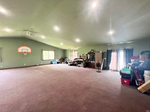 miscellaneous room featuring vaulted ceiling, carpet, and ceiling fan