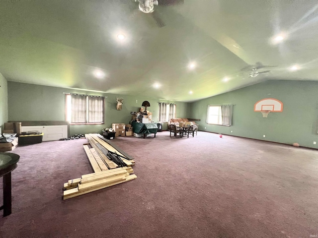 game room featuring lofted ceiling, carpet floors, and ceiling fan