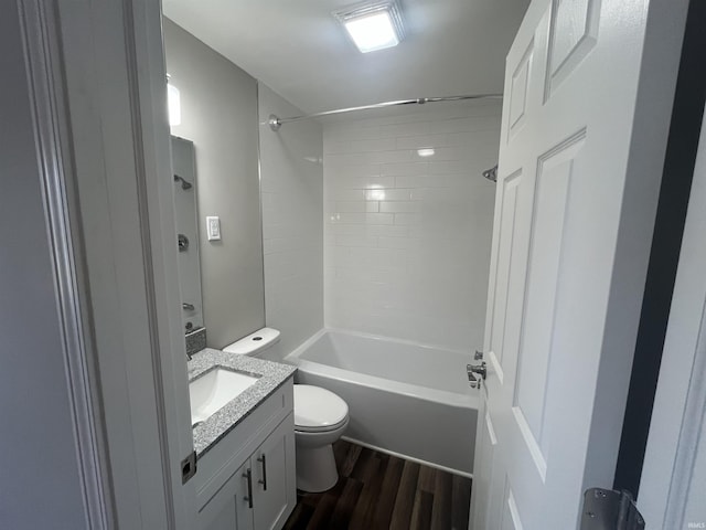 full bathroom featuring shower / bath combination, vanity, toilet, and wood finished floors