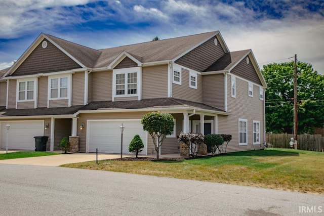 view of front facade featuring a garage and a front yard