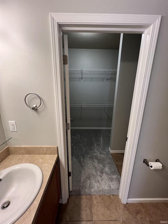 bathroom featuring vanity and tile patterned floors