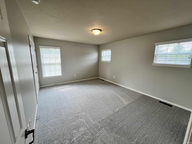 empty room featuring carpet