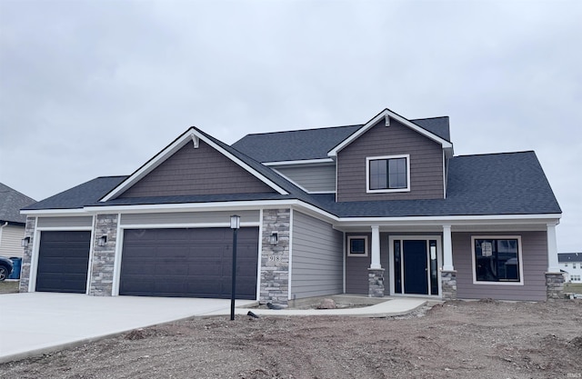 craftsman house featuring a garage