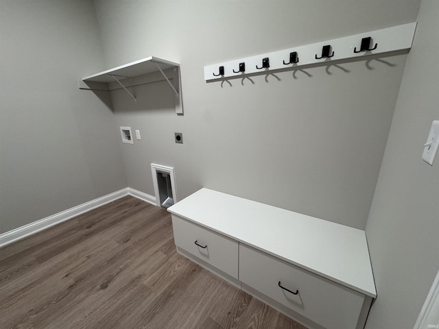 laundry room with hardwood / wood-style flooring, electric dryer hookup, and washer hookup