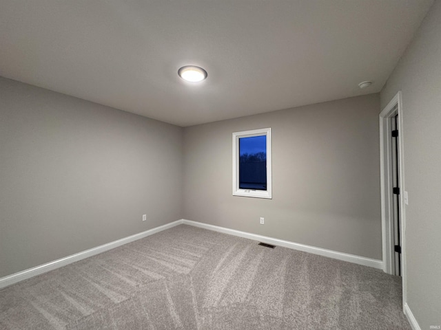 spare room with carpet flooring