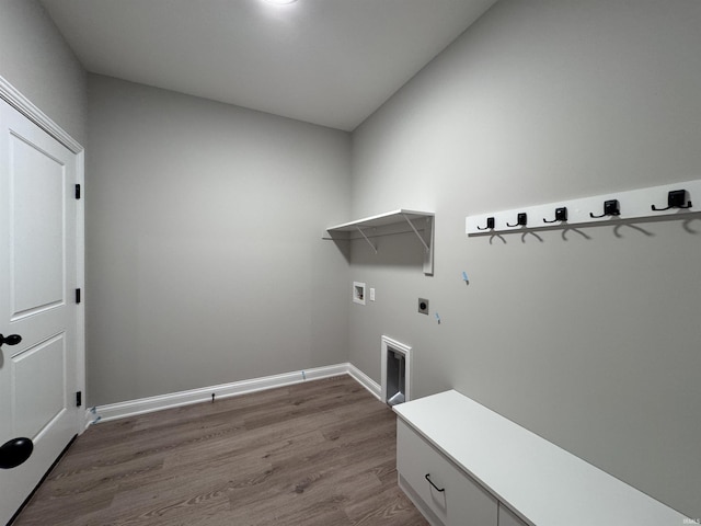 laundry area featuring electric dryer hookup, wood-type flooring, and washer hookup