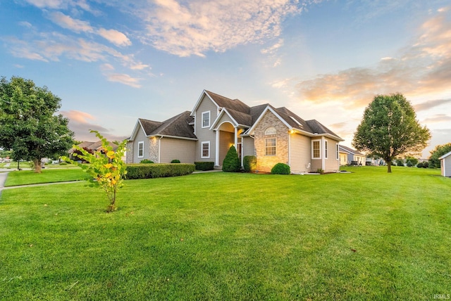 front of property featuring a lawn