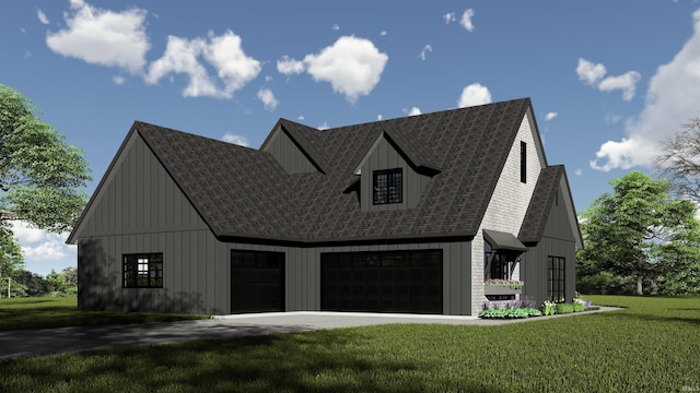 view of front of home with a front lawn and a garage