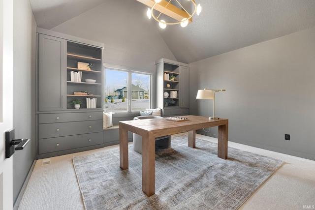 office area featuring light carpet, high vaulted ceiling, and a chandelier