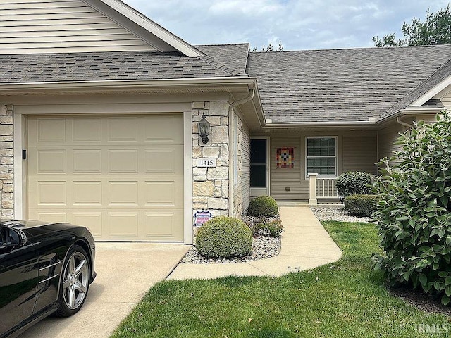 ranch-style house featuring a garage