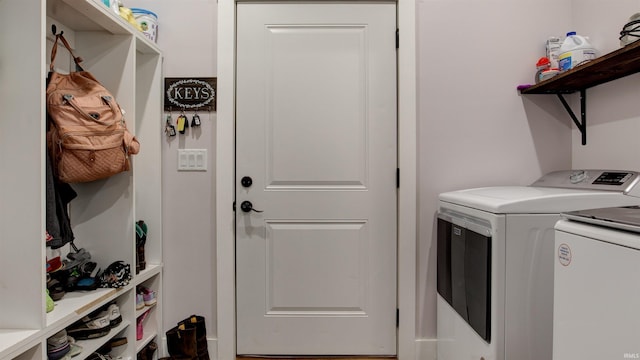 washroom featuring separate washer and dryer