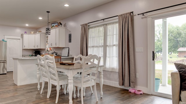 dining space featuring light wood-type flooring